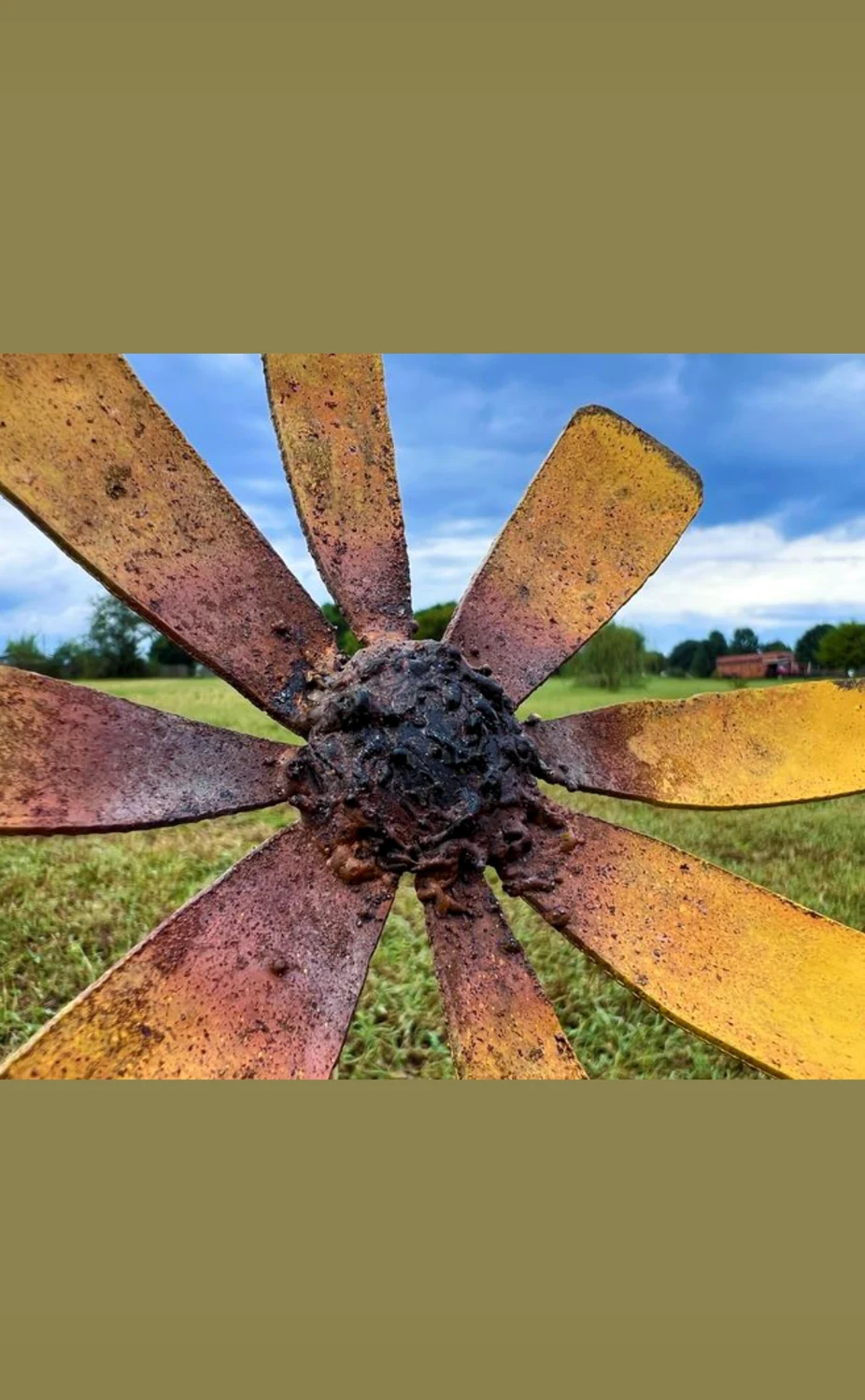 Close view of a large radial metal flower